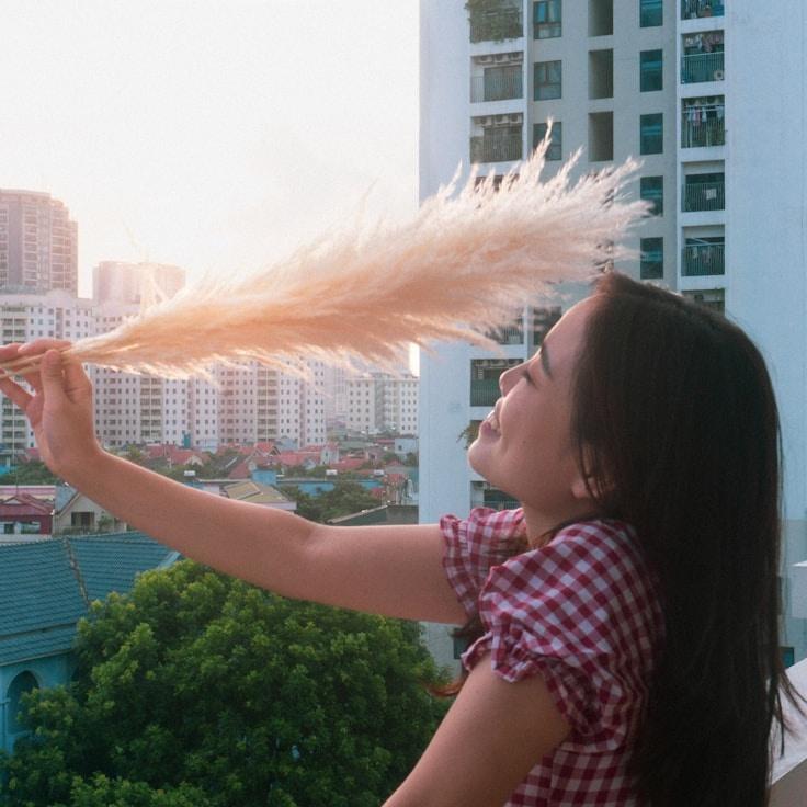 Alex Rivera, Lead Design Curator at Golden Vista Port, reviewing corporate floral arrangements